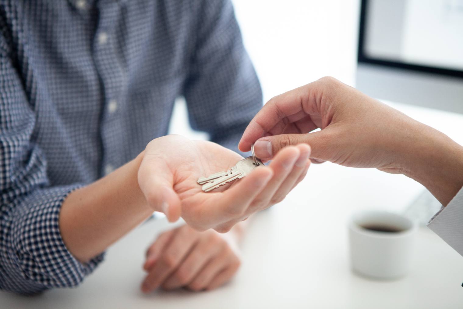 Tenant handing property keys back at the end of a tenancy